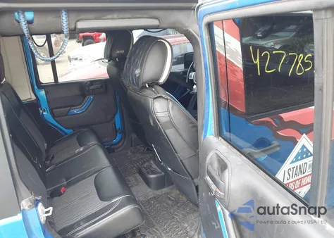 2015 Jeep Wrangler Unlimited Freedom Edition из США, поврежденный, VIN 1C4BJWDG4FL568470